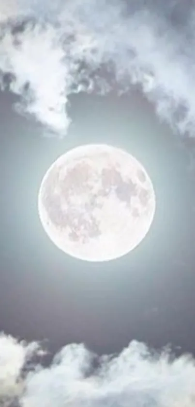 Serene night sky with full moon and clouds.