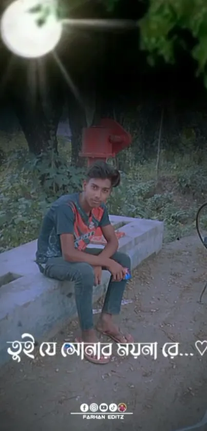 Young man sitting by bicycle under moonlit sky.