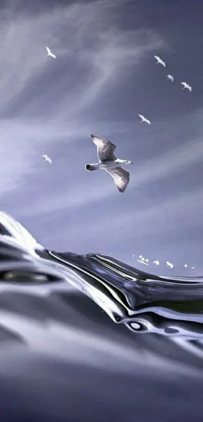 Seagull flying over ocean waves under a serene, cloudy sky wallpaper.