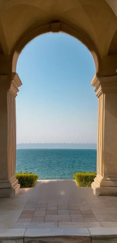 Mobile wallpaper of ocean view through an elegant arch.