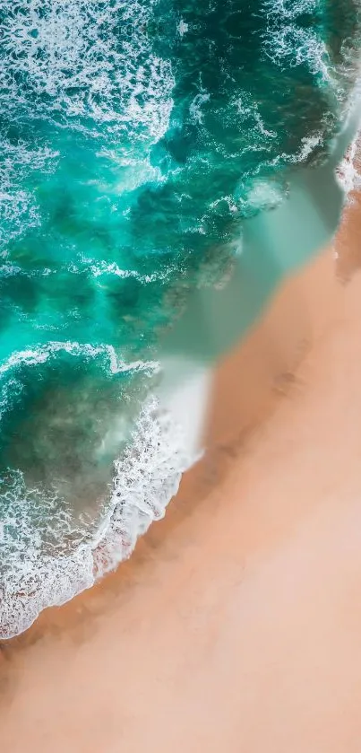 Serene beach with teal waves and sand.