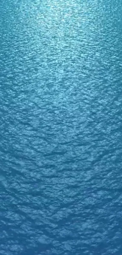 Serene ocean blue wallpaper with rippling water effect.