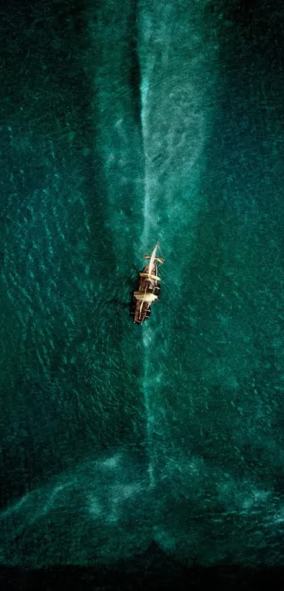 Aerial shot of a boat on a vast teal ocean, viewed from above.