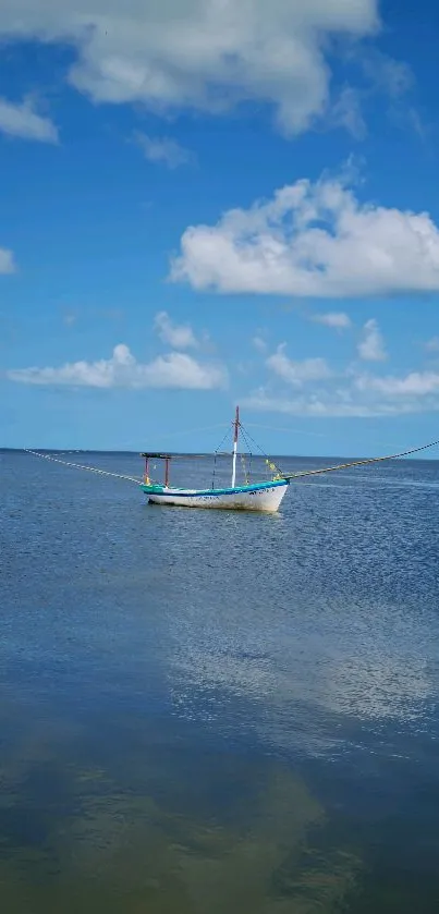 Lone boat floating on calm ocean under clear blue sky.