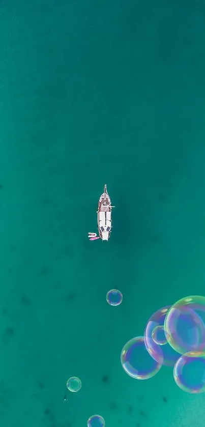 A yacht drifts on turquoise ocean water with colorful floating bubbles.