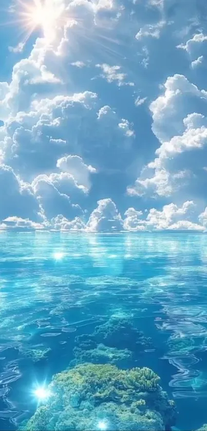 Serene ocean with clouds against a blue sky.