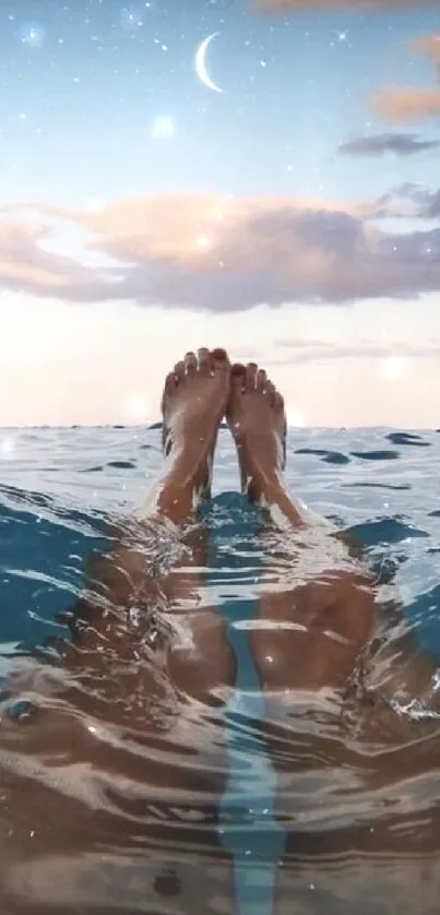 Feet in tranquil ocean under crescent moon and serene evening sky.