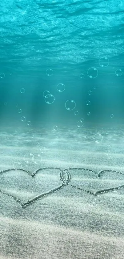 Underwater sand hearts with ocean bubbles.