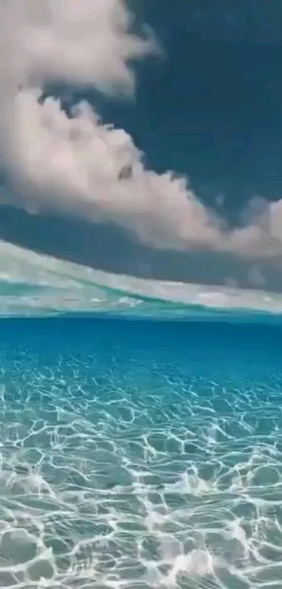 Serene ocean scene with clouds and blue sky.