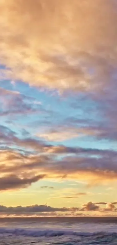 Serene sunset over ocean with pastel sky and clouds.