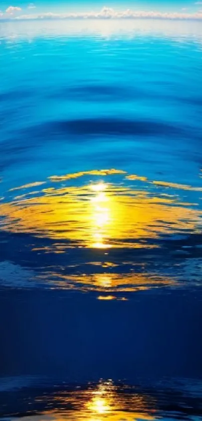 Serene blue ocean with golden sunset reflection.