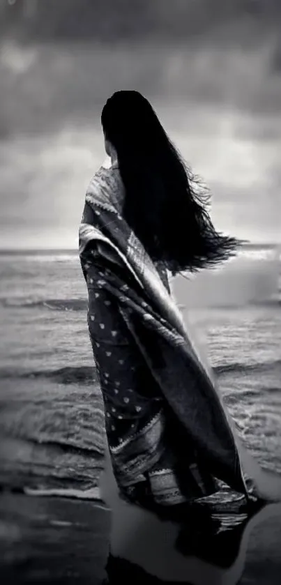 Black and white silhouette on a beach.