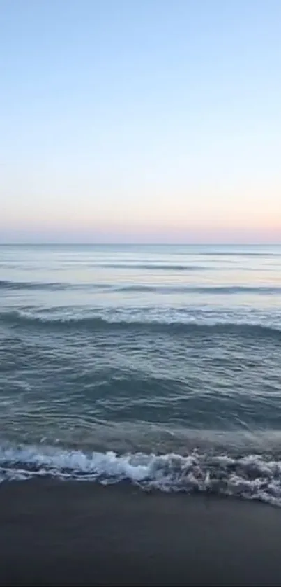 Calm ocean view with gentle waves and blue sky