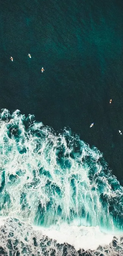 Aerial view of teal ocean waves in motion, creating a serene and dynamic scene.