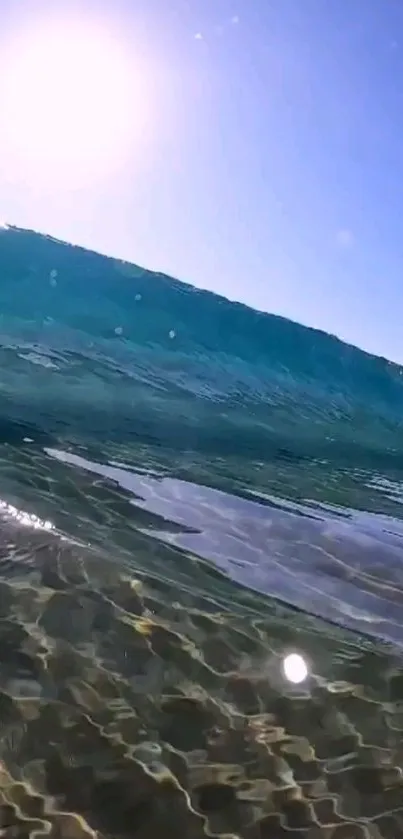 Scenic ocean wave with clear blue sky.