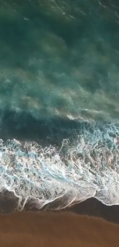 Aerial view of serene ocean waves with blue-green hues.