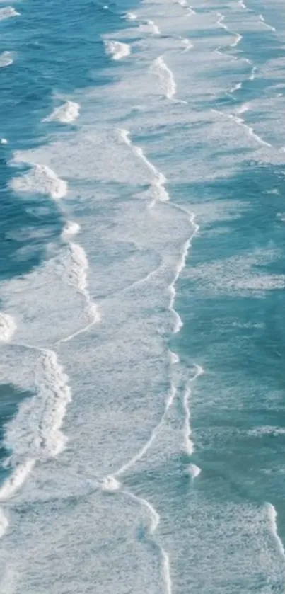 Serene ocean waves with teal blue hues for phone wallpaper.