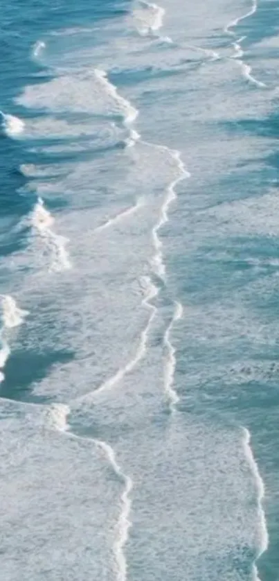 Serene ocean waves with blue and white foamy textures.