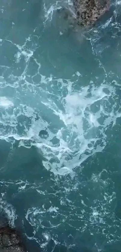 Serene ocean waves with blue and white surf.