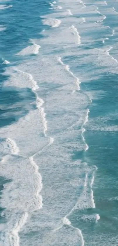 Ocean waves crashing gently on the beach with a calming blue hue.