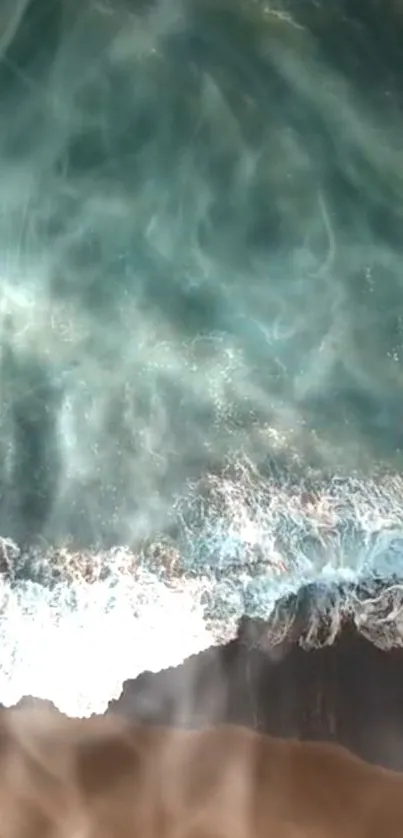 Tranquil view of ocean waves washing ashore in seafoam green hues.