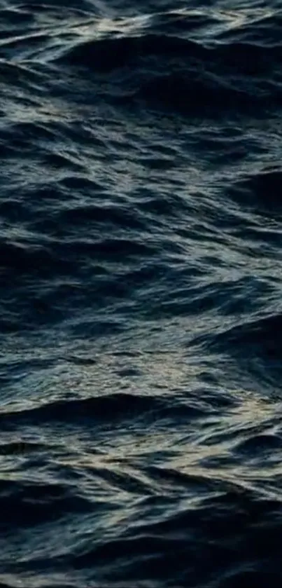 Serene dark ocean waves on a peaceful sea.