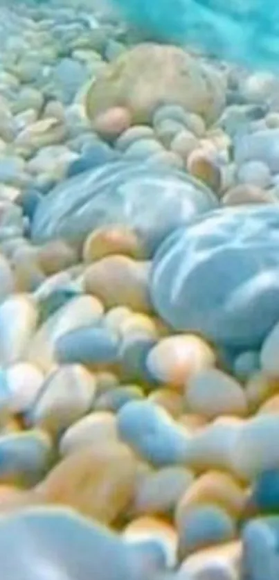 Serene underwater view of pebbles on a calm beach with light blue hues.