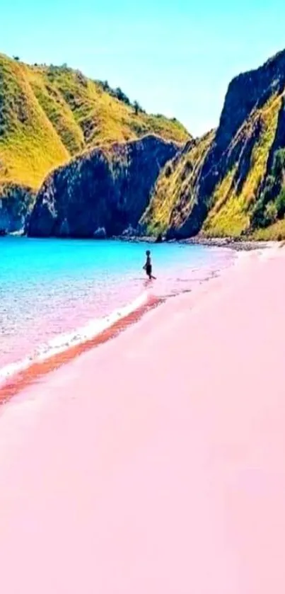 Scenic wallpaper of pink sandy beach against turquoise ocean and lush green hills.