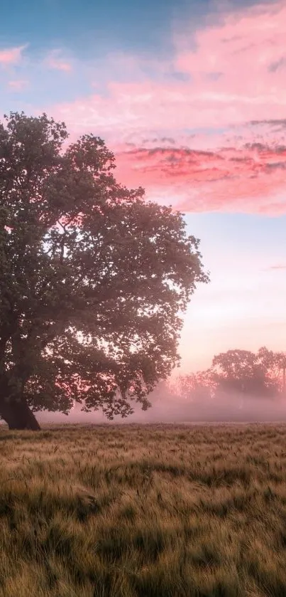 Serene landscape with pink sky and a lush tree at sunset.