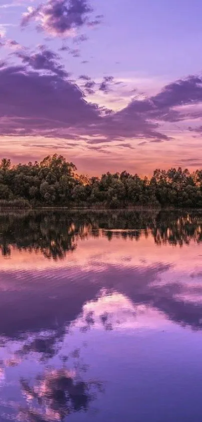 Purple sunset over a tranquil lake with reflections in the water.