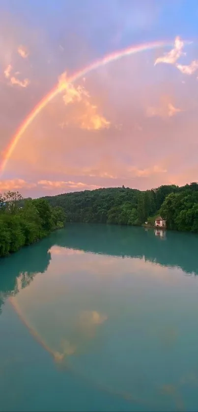 Scenic view of a rainbow over a tranquil lake with greenery.