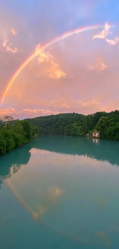 A vibrant rainbow arches over a serene lake under a pastel sky.