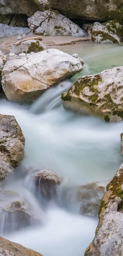 Serene river flowing over rocks in a tranquil green setting.
