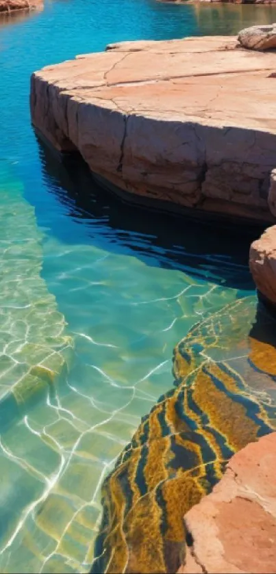 Serene rock pool with turquoise water and red rocks in natural sunlight.