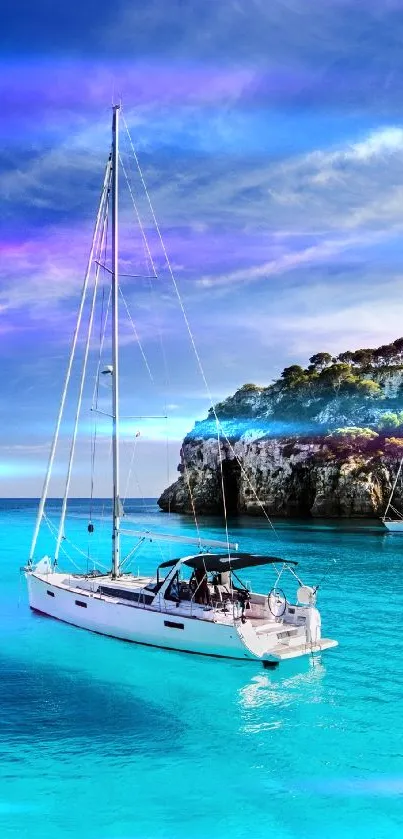 Sailboat gliding on turquoise waters with blue sky backdrop.