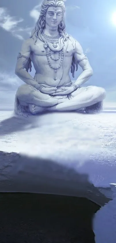 Statue of Lord Shiva meditating against a blue sky backdrop.