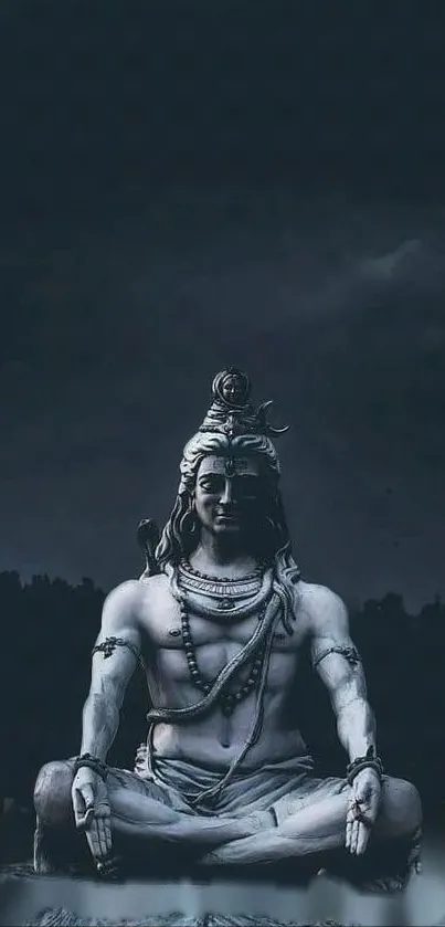 Serene Shiva statue against a dark, tranquil background.