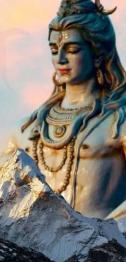 Statue of Shiva with mountain backdrop, serene setting.