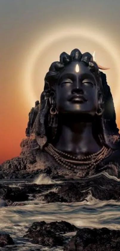 A majestic Shiva statue with a glowing halo against a serene sunset backdrop.