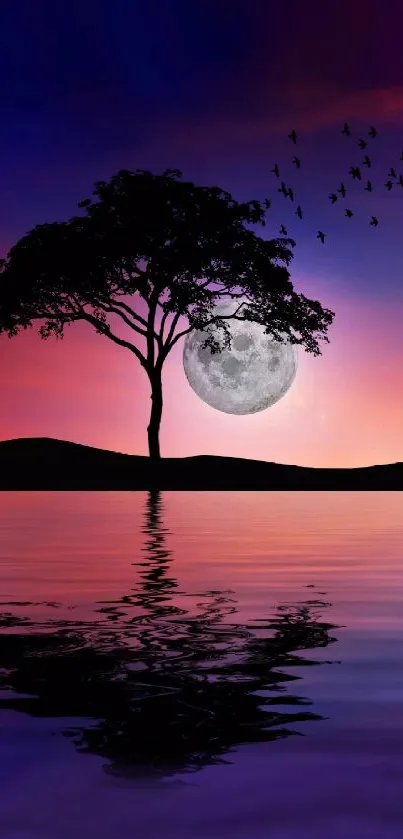 Tree silhouette with moon reflection at night over vibrant purple sky.