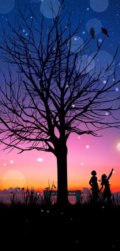 Silhouette of tree and people under a vibrant purple night sky.