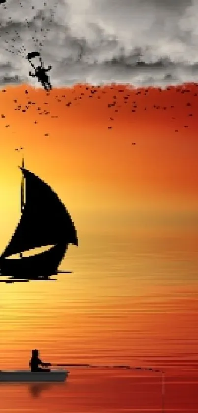 Silhouette of tree and sailboat against vibrant sunset sky.