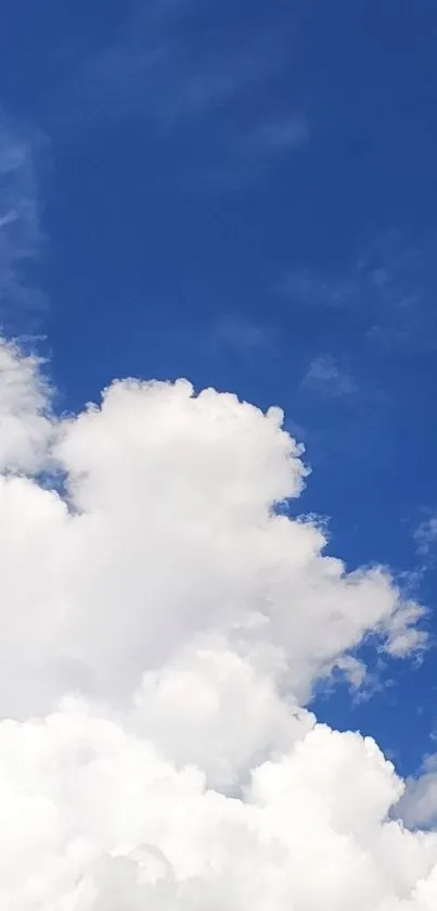 Serene blue sky with white clouds mobile wallpaper.