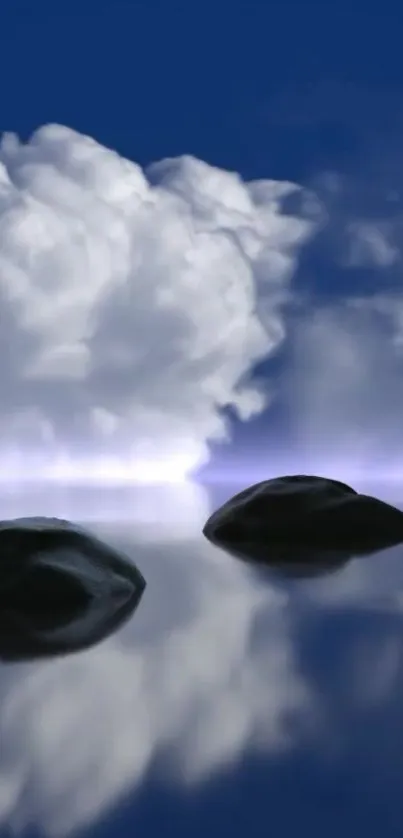 Calming clouds and stones reflected on serene water under a deep blue sky.