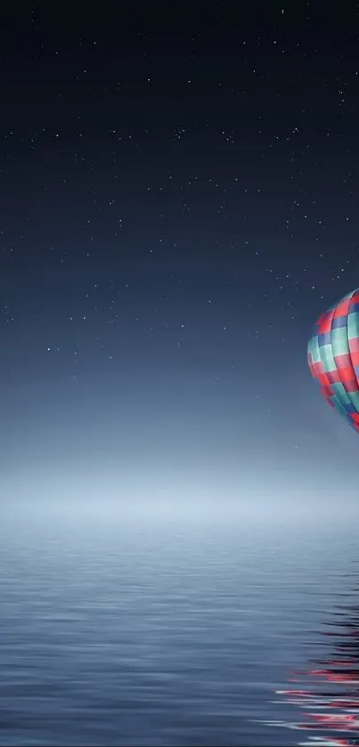 Hot air balloon over calm water under a starlit sky, designed for mobile screens.