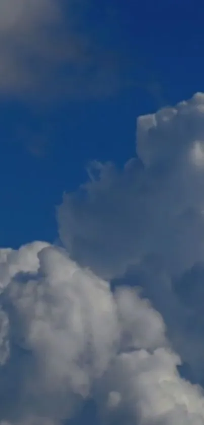 Serene clouds against a blue sky.