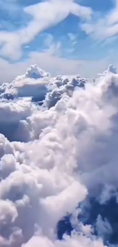 Serene sky with fluffy white clouds over a blue background.