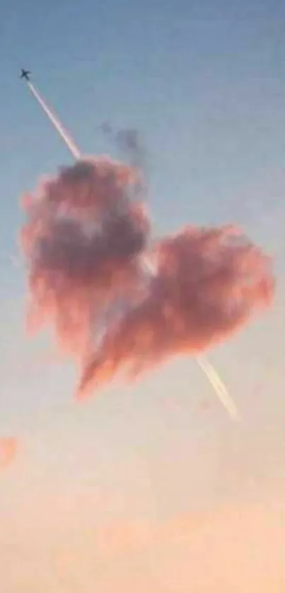 Heart-shaped pink clouds against a soft blue sky.