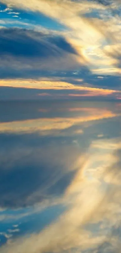 Misty clouds reflected in calm blue water creating a serene landscape.