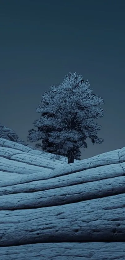 A serene snowy landscape with a lone tree under a twilight sky.